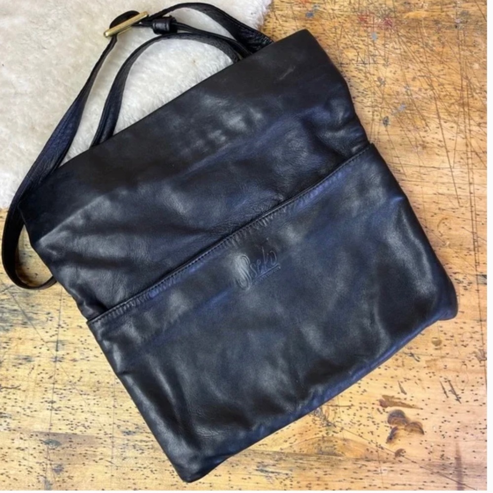NWOT Sseko convertible crossbody bag.